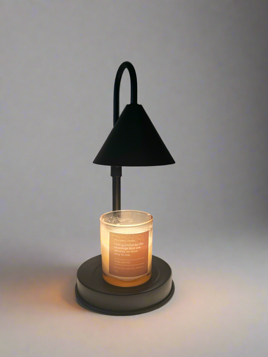 Candle is on the Black Candle Warmer Lamp