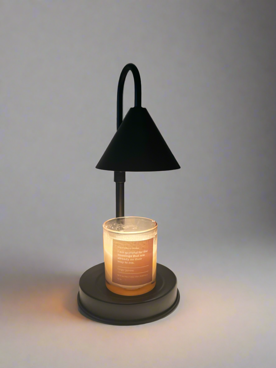 Candle is on the Black Candle Warmer Lamp